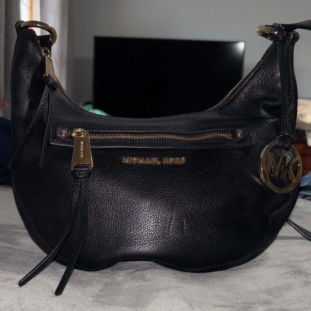 Michael Kors Black Hobo Bag with Gold Accents